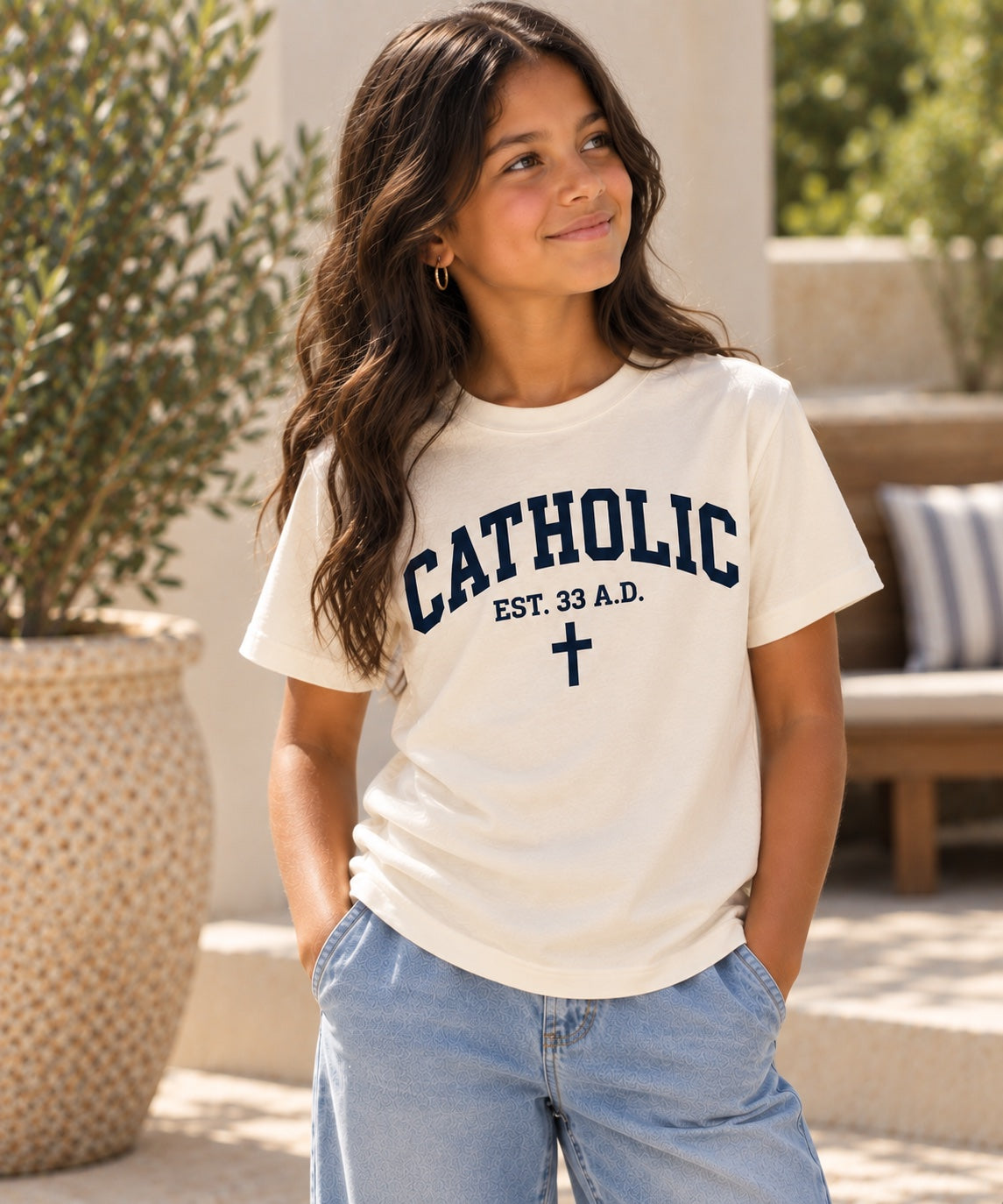 Catholic Varsity T-Shirt for Youth Girls: Natural shirt with navy lettering