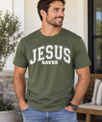 Model wearing a green Jesus Saves T-shirt with white varsity lettering.