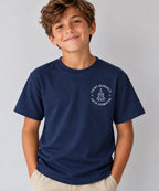 Saint Raphael’s Faith Formation youth T-shirt in navy, worn by a boy