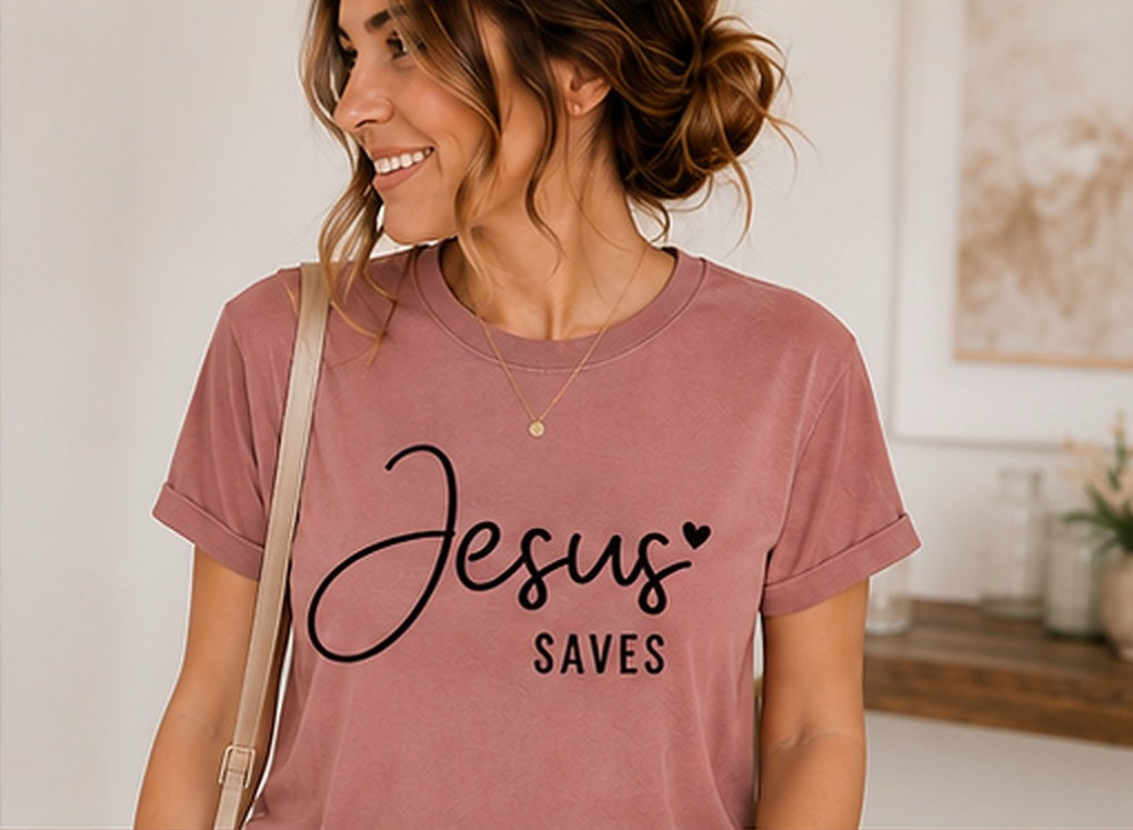 On-model mockup of a mauve T-shirt with the Jesus Saves design in black lettering.